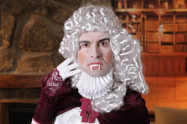 istock Dramatic vampire in vintage costume 1347471959