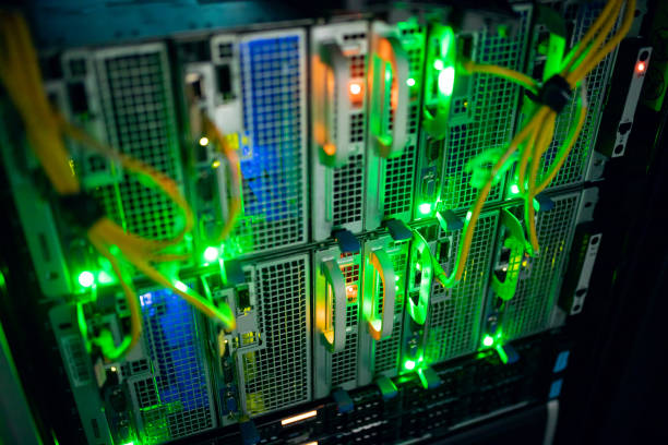 istock Closeup of computer server with colorful lights and wires 1347473403