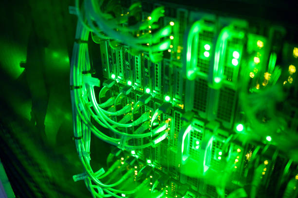istock Closeup of computer server with colorful lights and wires 1347473416