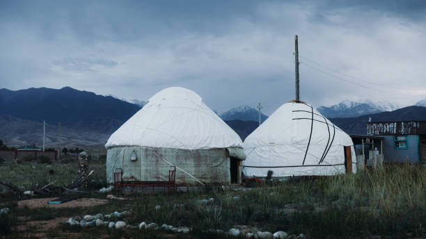 istock Dramatic sunset summer sky above the traditional yurts in Central Asia 1347475352