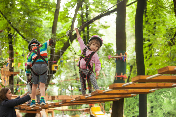 istock People In Playground Against Trees 1347476735
