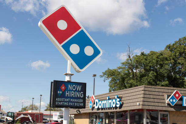 Domino's Pizza Restaurant. Domino's delivers more than 1 million pizzas a day. Frankfort - Circa October 2021: Domino's Pizza Restaurant. Domino's delivers more than 1 million pizzas a day. domino photos stock pictures, royalty-free photos & images