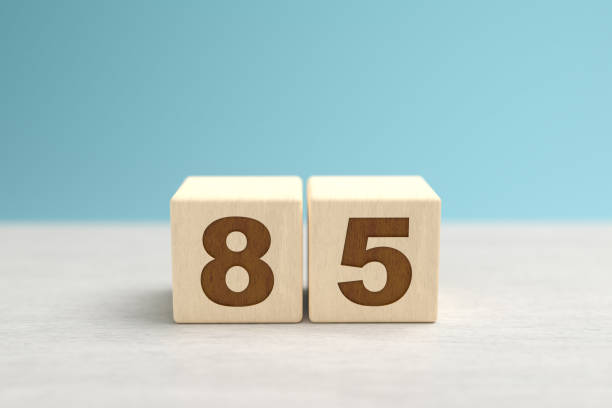 istock Wooden toy blocks forming the number 85. 1347480101