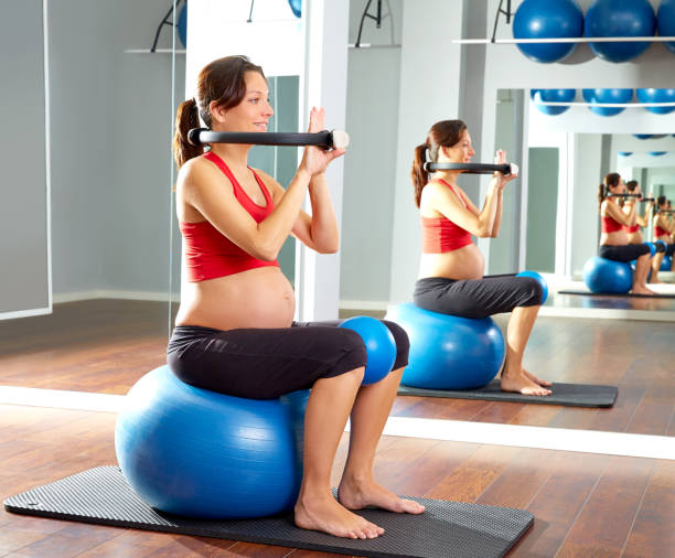 istock pregnant woman pilates exercise magic ring 1347481979