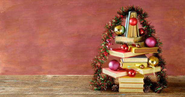 istock book as  christmas gift,christmas present,reading,literature,education,making a gift concept, copy space 1347484578