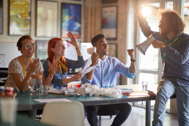istock Group of young employees working together at the office 1347485429