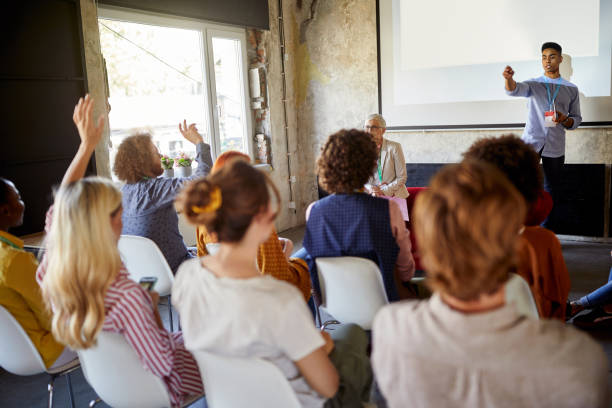 istock Young afro american employee holding a presentation 1347485982