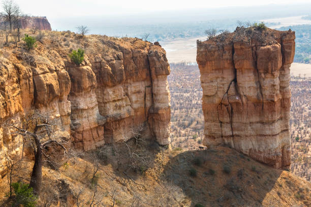 These red sandstone cliffs have been formed through erosion and overlook the Runde River valley in South East Zimbabwe.