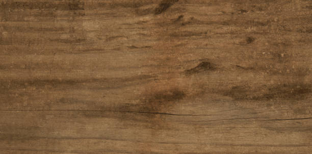 istock Natural Brown Wooden Background. Old boards. Copy space for your text. Texture and patterns on wooden rustic background. Blank for design and require a wood grain. 1347488397