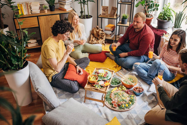 istock Friends hanging out at home 1347490999