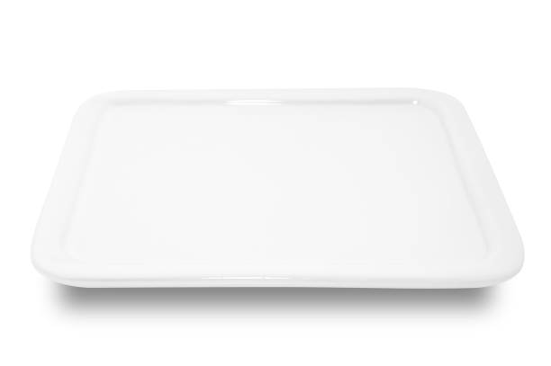 istock White square ceramics plate isolated on white background. 1347494012