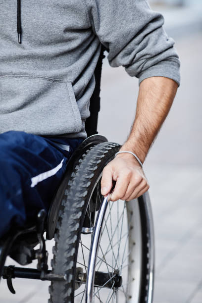 istock Man with disability sitting in wheelchair 1347496851
