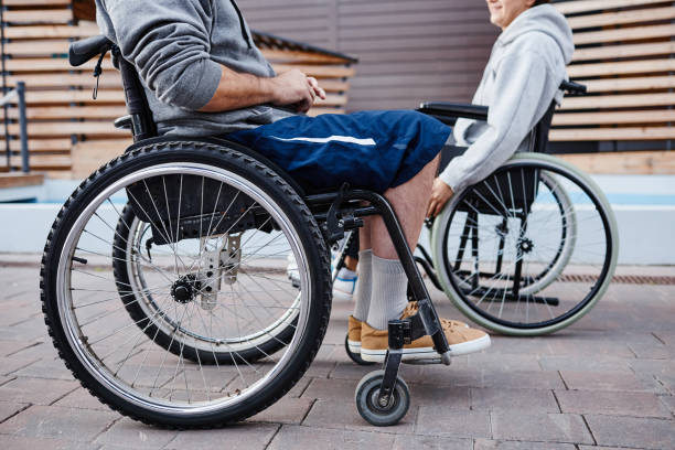 istock People with disability in wheelchairs 1347496880
