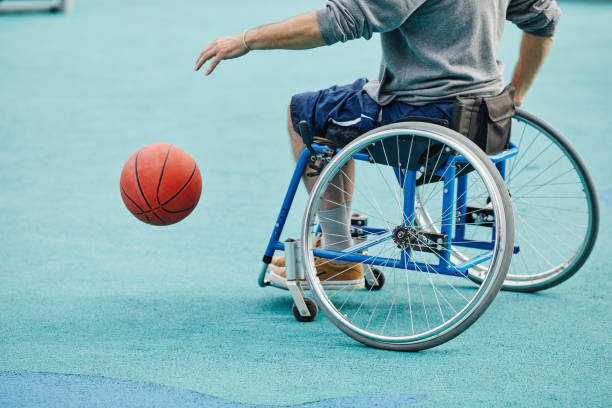 istock Sportsman with disability playing basketball 1347497046