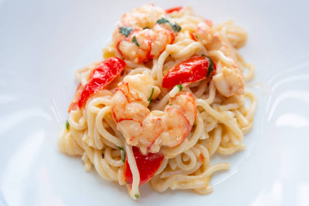 istock Noodles with prawns in cream sauce 1347504706