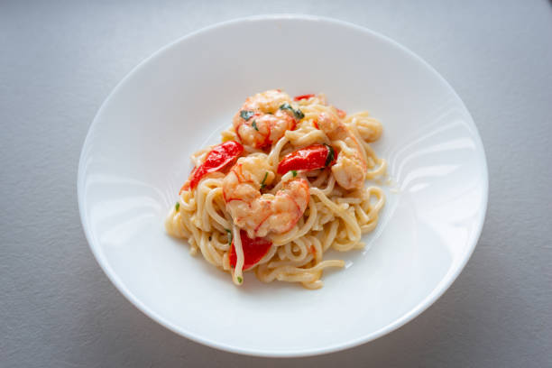 istock Noodles with prawns in cream sauce 1347504730
