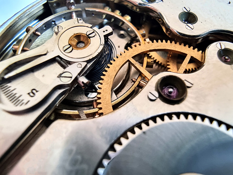 Close up of vintage railroad grade old pocket watch movement.