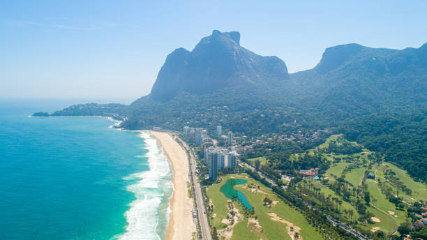 istock Tropical beach aerial view. Waves break on tropical yellow sand beach. 1347507739