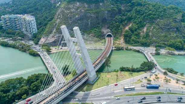 Photo of Train bridge above the river at Barra Da Tijuca, Rio de Janeiro, Brazil.