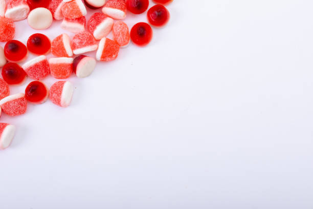 istock Composition of multiple halloween trick or treat sweets with copy space on white background 1347507938