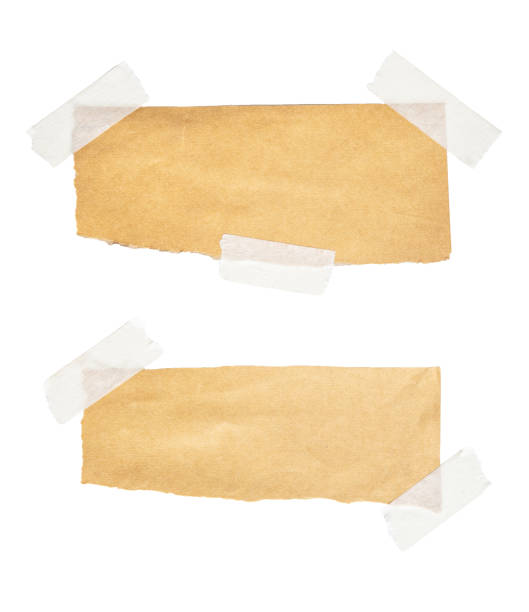 istock Brown paper labels attached with sticky tape on white background 1347510085