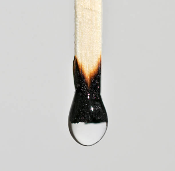 istock Conceptual  match and Water Drop on white background 1347510373