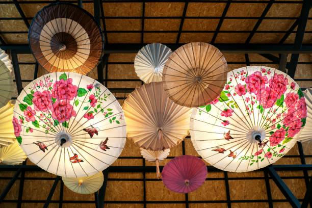 istock Umbrellas and lanterns around  during lantern festival. 1347510538