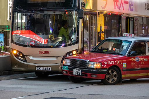 Hong Kong - October 18, 2021 : A bus and a taxi crash with each other on Nathan Road, Mong Kok, Kowloon, Hong Kong.