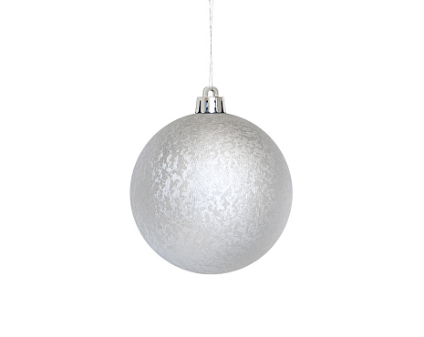 large gray ball with patterns hangs on a rope isolated on a white background.