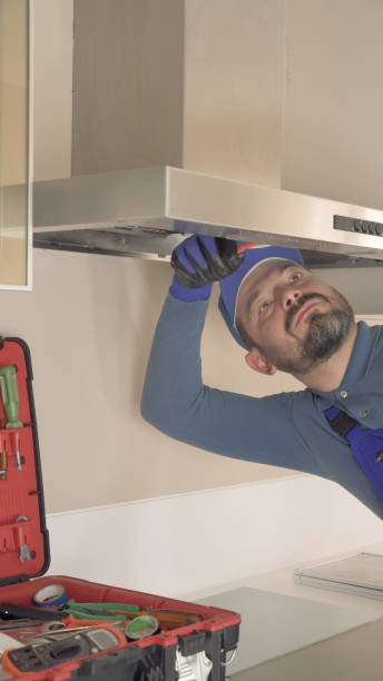 istock Kitchen Hood Repairing 1347512825