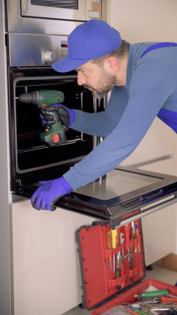 istock Oven Repairing 1347512999