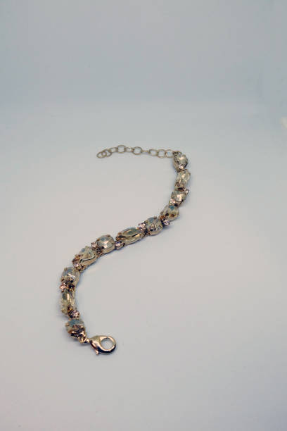 istock Women's bracelet on a white background. Bijoux and accessories 1347514065