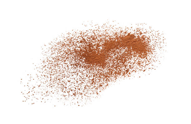 brown natural cocoa powder on white background - cinnamon imagens e fotografias de stock