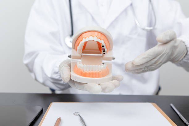 istock A dentist is diagnosing dental health 1347518515