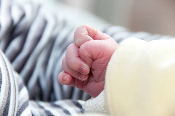 istock hand of newborn 1347520509
