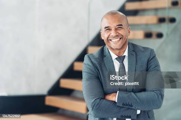 Portrait Of A Smiling Middle Aged Businessman Stock Photo - Download Image Now - Businessman, Men, African-American Ethnicity