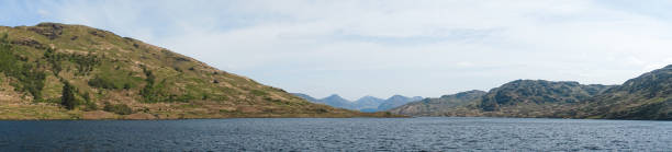 Panorama of Loch Lomond Waters and Mountain Range stock photo