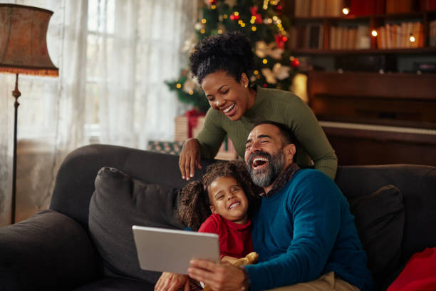 istock Family celebrating Christmas time via technology 1347524623
