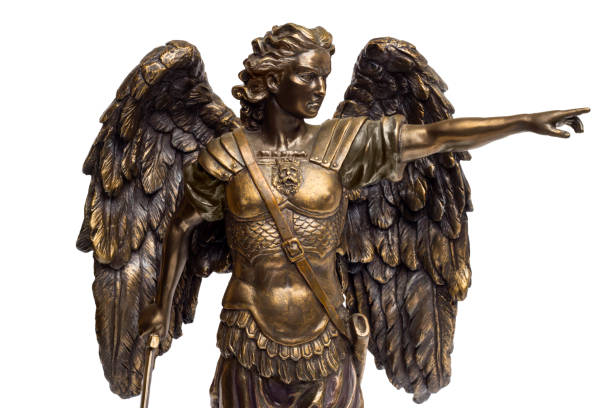 istock Bronze statue of Saint Michael on an isolated white background. 1347524940