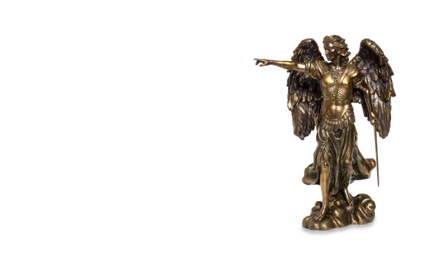 istock Bronze statue of Saint Michael on an isolated white background. 1347524964
