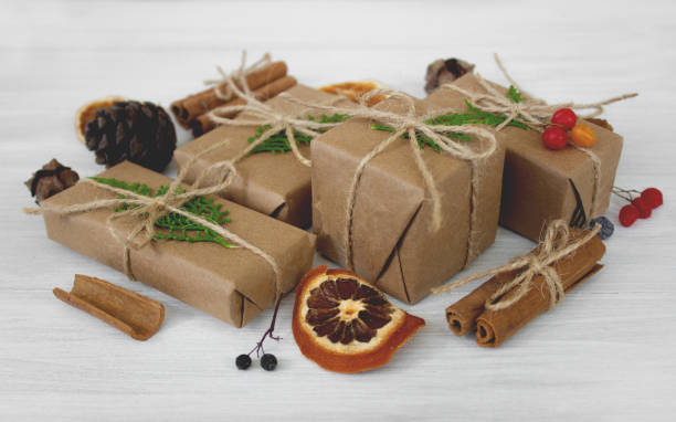istock Christmas decorations and gifts on a light background . Environmental wrapping and nature decorations. 1347524997