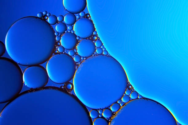 istock Macro of water drops on multicolor background. 1347525993