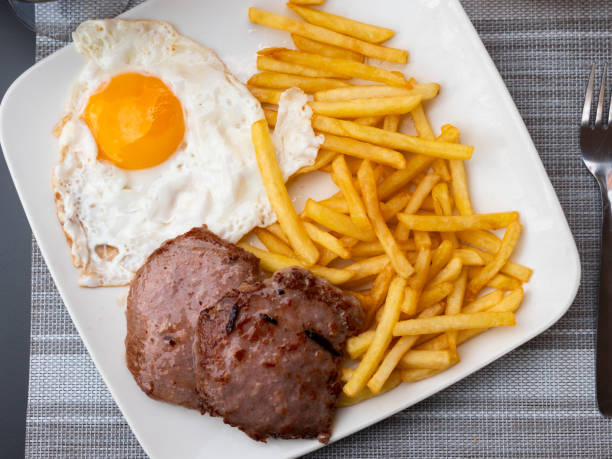 istock Roasted meat cutlet with potato and eggs 1347527202