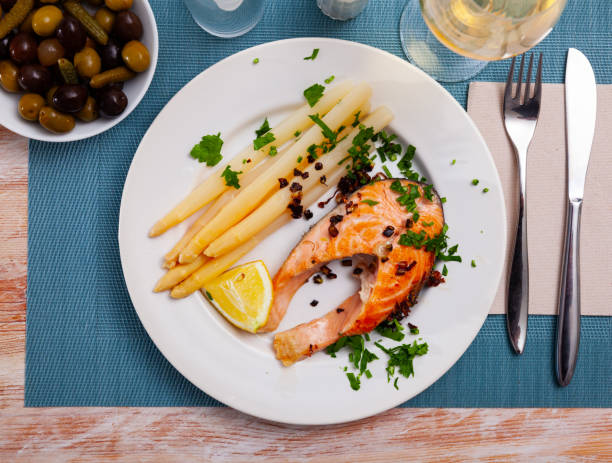 istock Grilled salmon steak with asparagus and lemon 1347527655