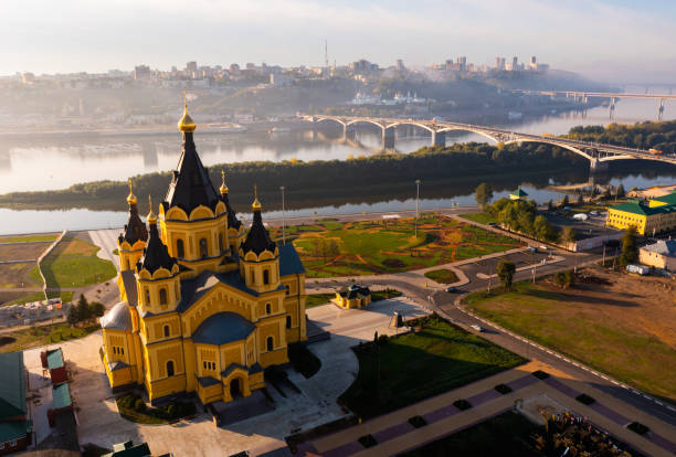 Cityscape of Nizhny Novgorod in morning Cityscape of Nizhny Novgorod in morning. Alexander Nevsky Cathedral and bridges across Oka River visible from above. nizhny novgorod stock pictures, royalty-free photos & images