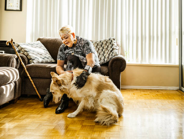 istock Mature Latin woman with disability and her dog 1347528764