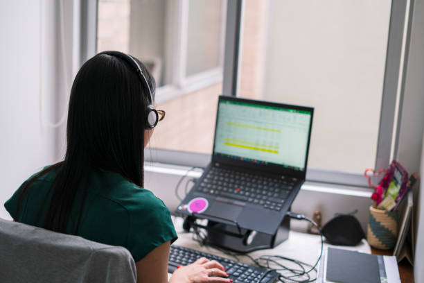 istock Latin woman is working from home through a video call 1347530789