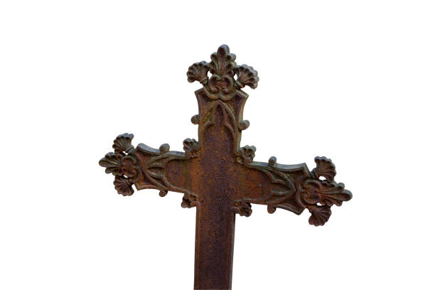 Old wrought iron grave cross isolated on white background