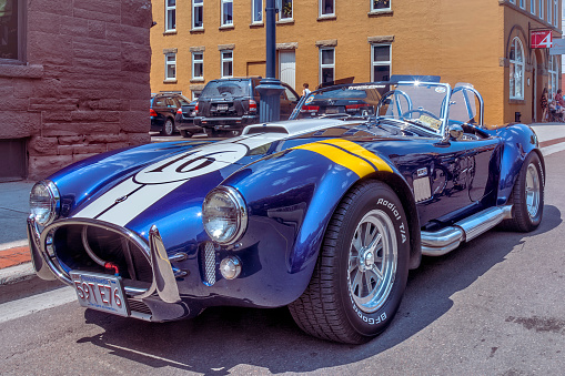 Moncton, New Brunswick, Canada - July 10, 2015  : 1965 Shelby American Cobra kit car parked in downtown Moncton during 2015 Atlantic Nationals, Moncton, New Brunswick, Canada.