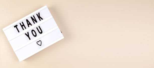istock Creative Top view flat lay lightbox with the text thank you 1347534823